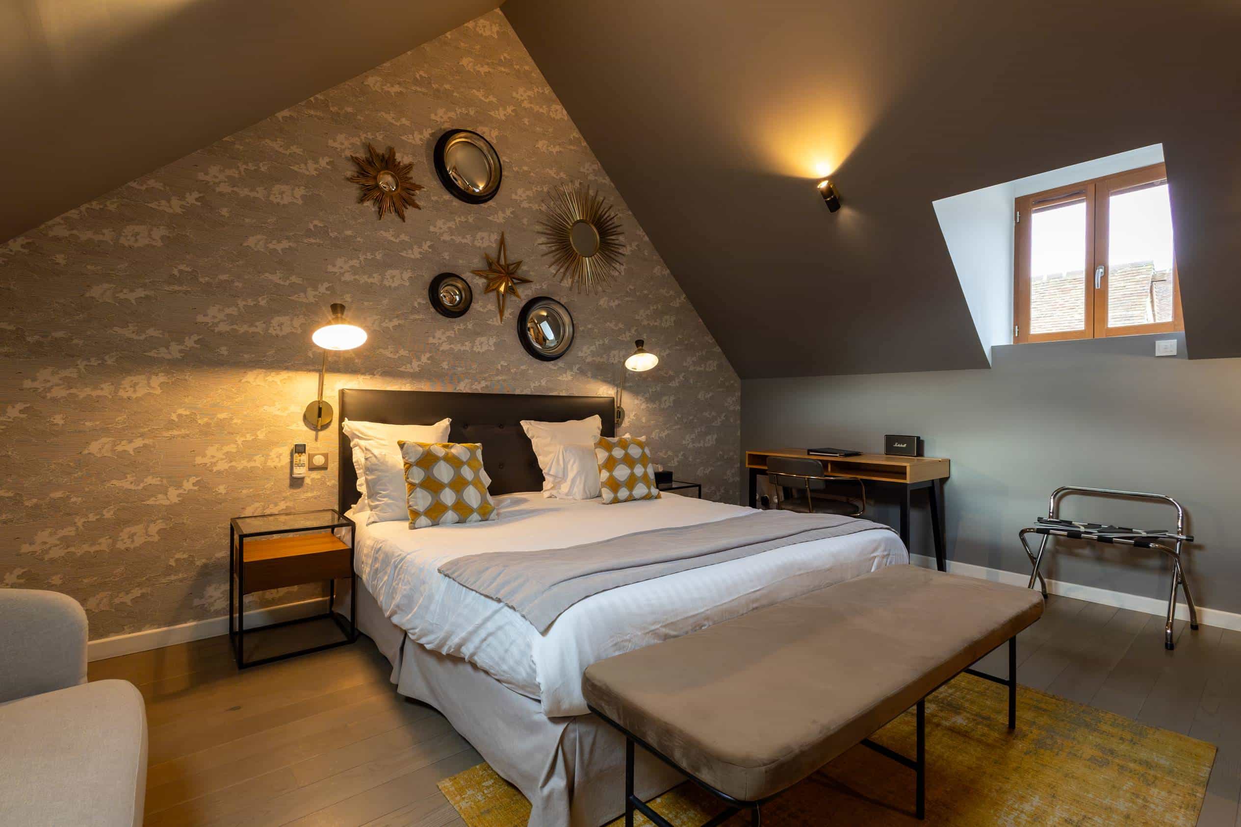 Lit King Size dans la chambre Coquette, idéale pour un weekend en amoureux