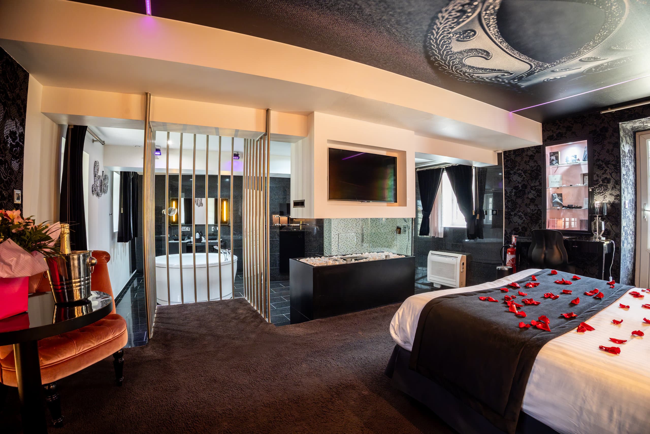 Suite romantique idéale pour une évasion en couple avec jacuzzi privatif